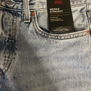 Levi’s light wash high waisted jeans.